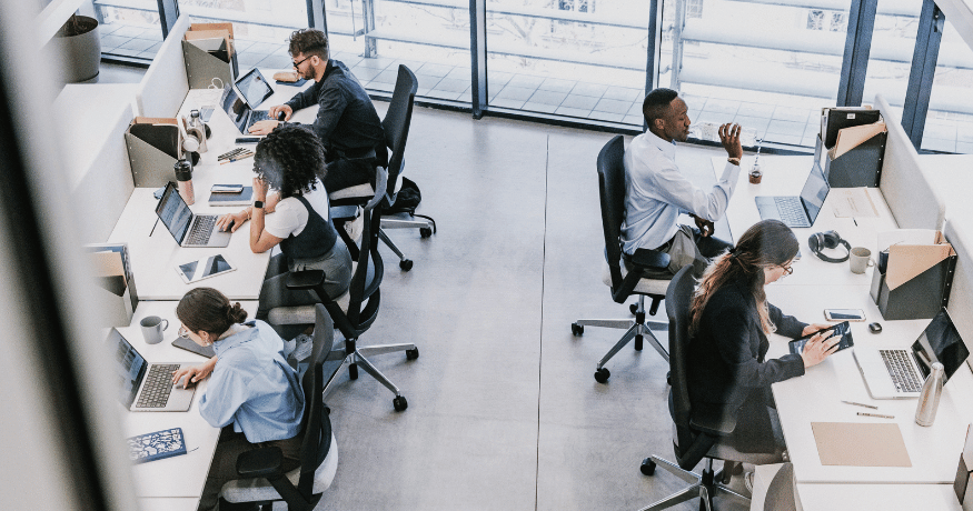 woman viewing hr compliance checklist with team in background