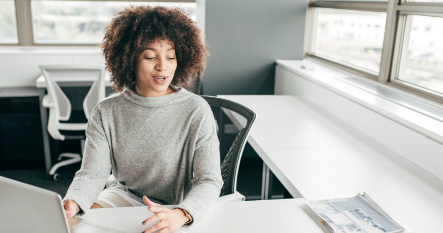 hr_admin_services_0019_Layer 3 woman viewing hr compliance checklist with team in background
