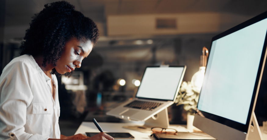 woman viewing hr compliance checklist with team in background