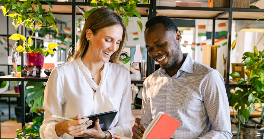 woman viewing hr compliance checklist with team in background
