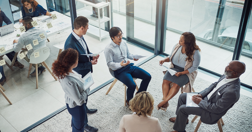 woman viewing hr compliance checklist with team in background