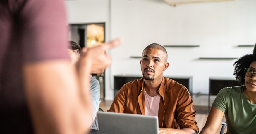 woman viewing hr compliance checklist with team in background