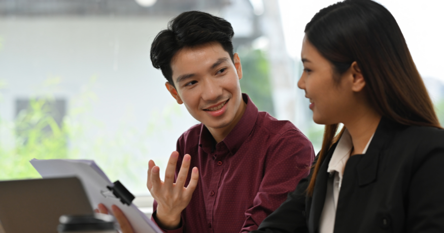 woman viewing hr compliance checklist with team in background