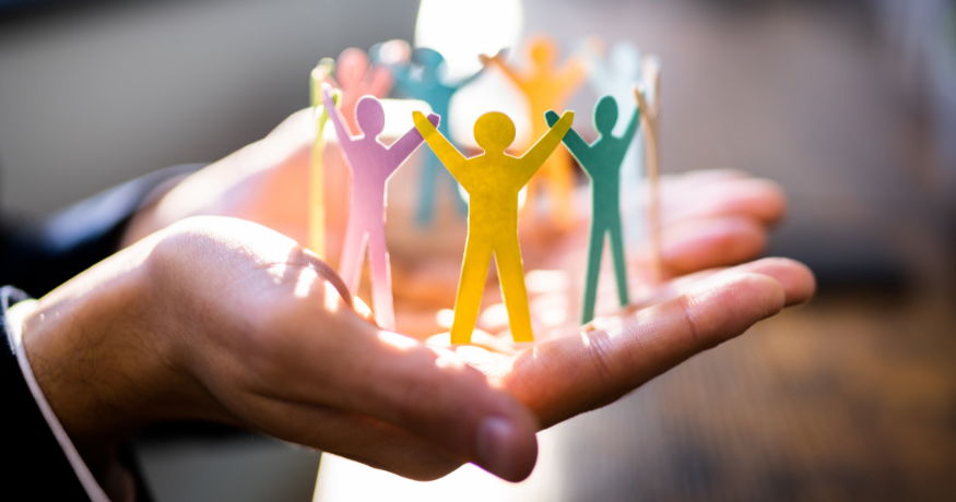 hr_admin_services_0019_Layer 3 woman viewing hr compliance checklist with team in background