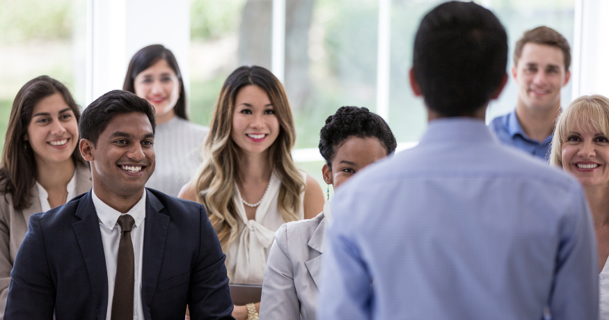 hr_admin_services_0019_Layer 3 woman viewing hr compliance checklist with team in background