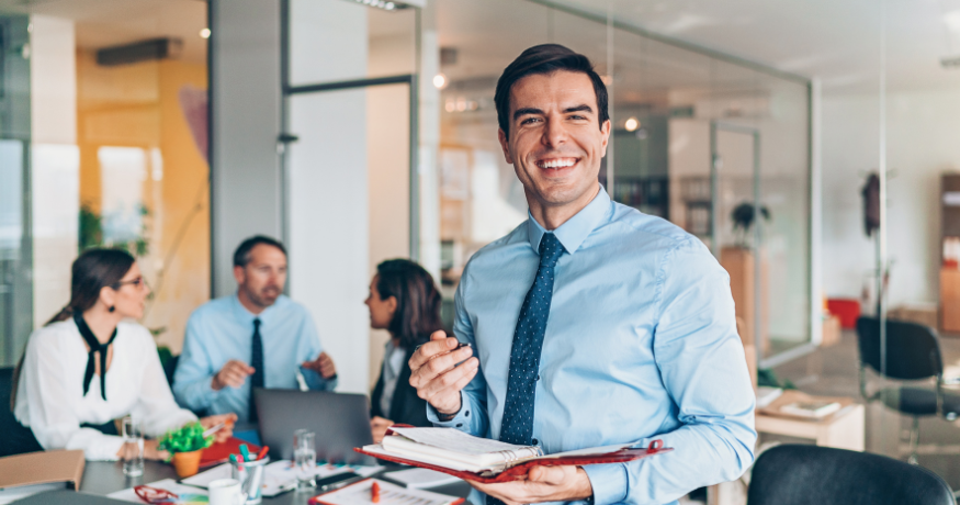 hr_admin_services_0019_Layer 3 woman viewing hr compliance checklist with team in background