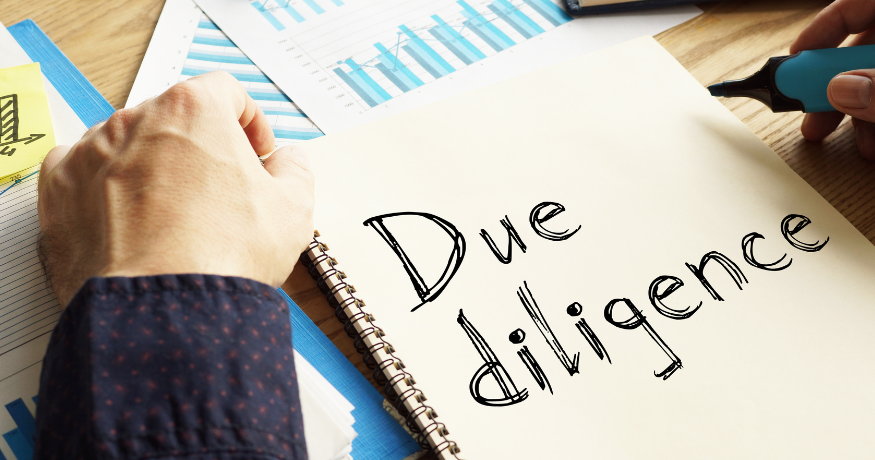 woman viewing hr compliance checklist with team in background