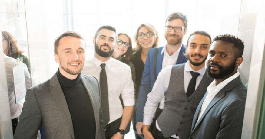 hr_admin_services_0019_Layer 3 woman viewing hr compliance checklist with team in background