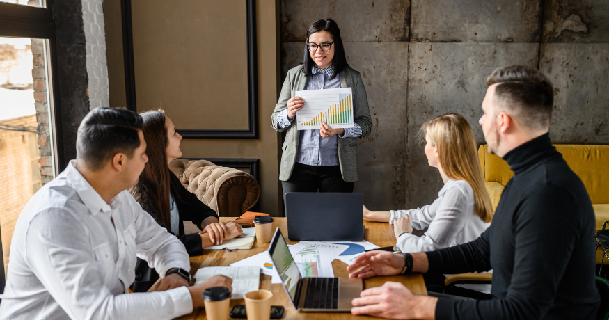 hr_admin_services_0019_Layer 3 woman viewing hr compliance checklist with team in background