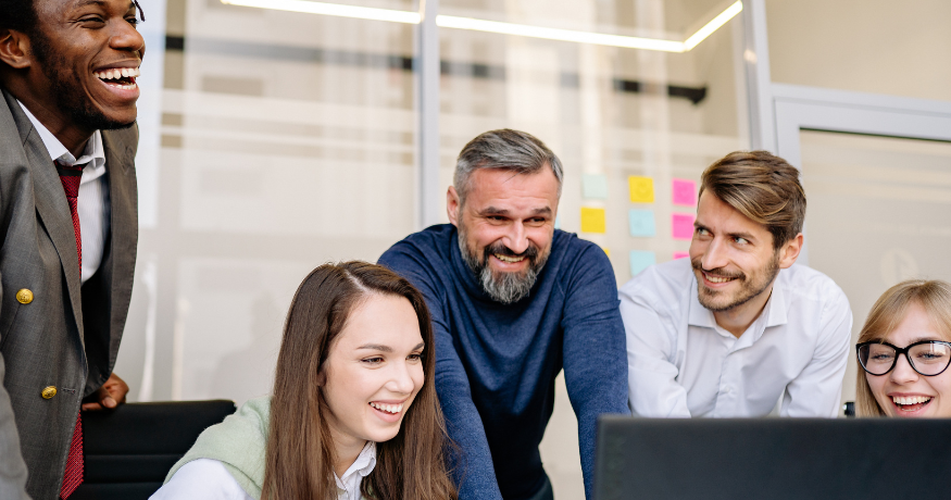 hr_admin_services_0019_Layer 3 woman viewing hr compliance checklist with team in background