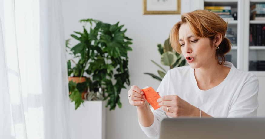 hr_admin_services_0019_Layer 3 woman viewing hr compliance checklist with team in background