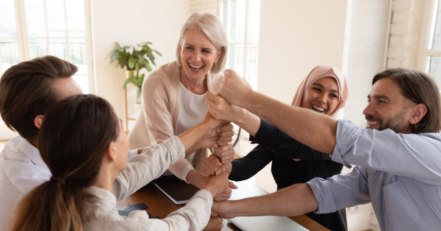 hr_admin_services_0019_Layer 3 woman viewing hr compliance checklist with team in background