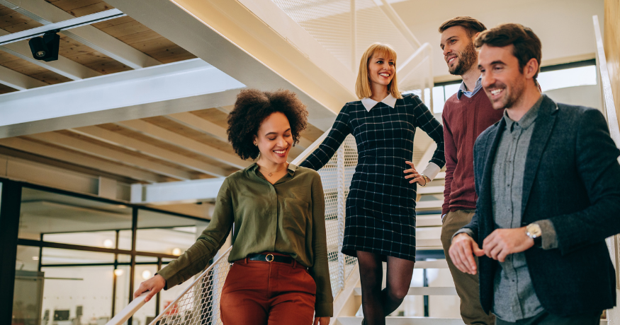 hr_admin_services_0019_Layer 3 woman viewing hr compliance checklist with team in background