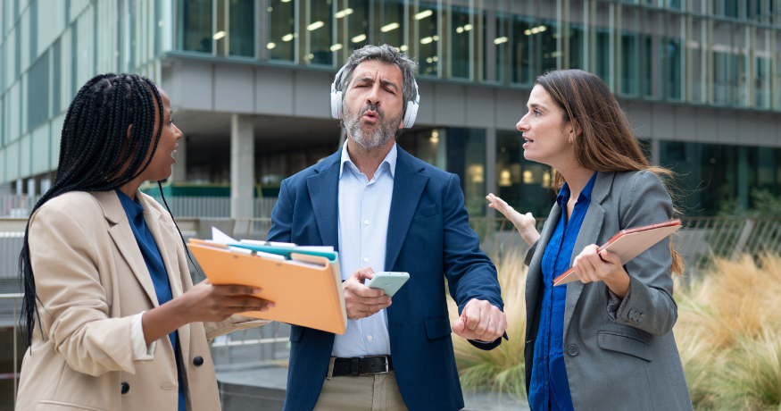 hr_admin_services_0019_Layer 3 woman viewing hr compliance checklist with team in background