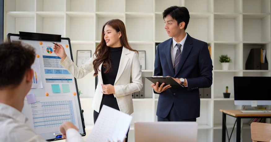 hr_admin_services_0019_Layer 3 woman viewing hr compliance checklist with team in background