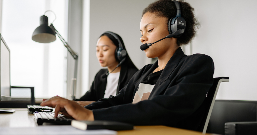 hr_admin_services_0019_Layer 3 woman viewing hr compliance checklist with team in background
