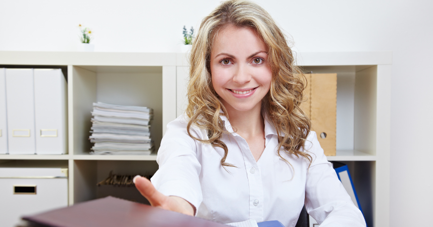 hr_admin_services_0019_Layer 3 woman viewing hr compliance checklist with team in background